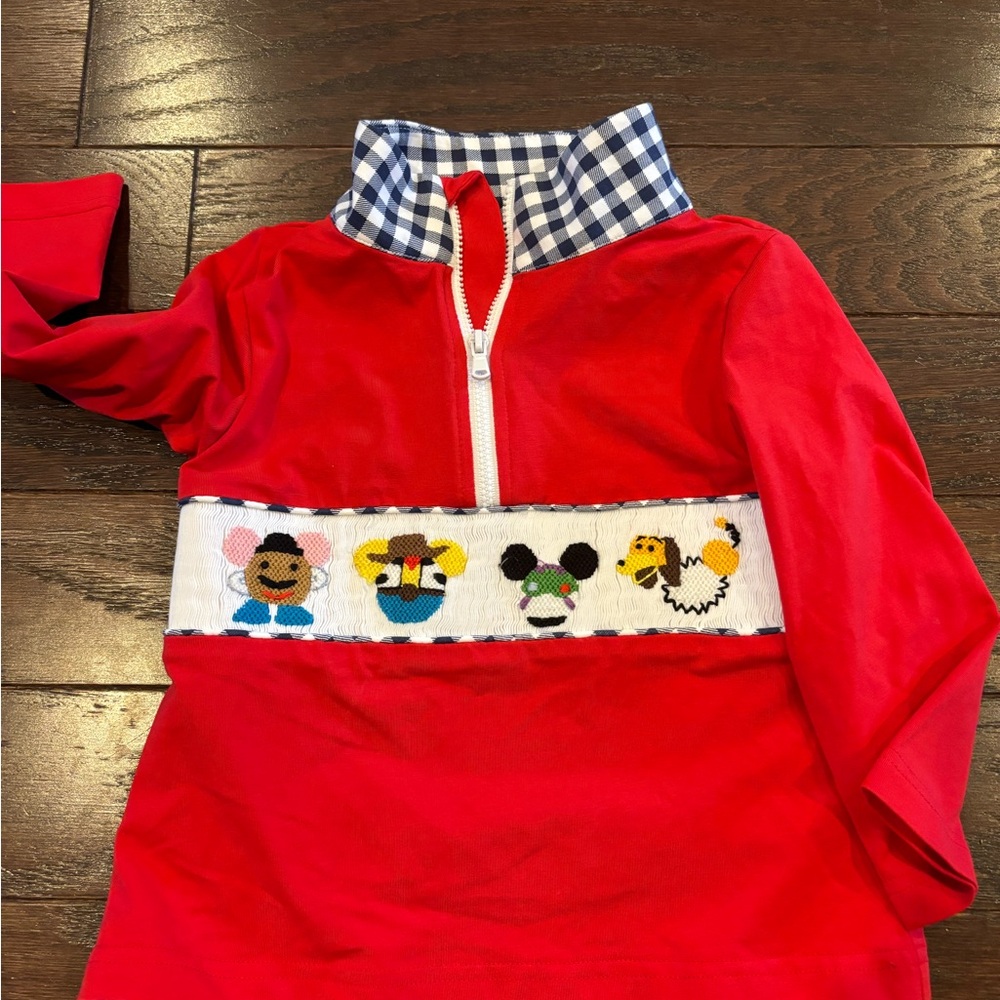 Red Quarter-Zip Disney smocked Pullover with Embroidered Characters never worn